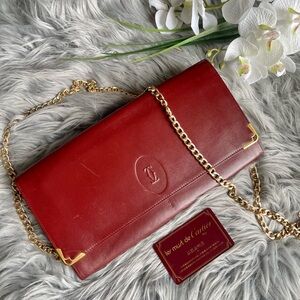Authentic vintage Cartier leather clutch bag
